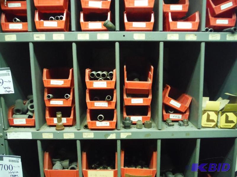 lot 1699 image: Metal Pipe Bends, Threaded Straight Piping, Adapters, Plastic Containers, And More.