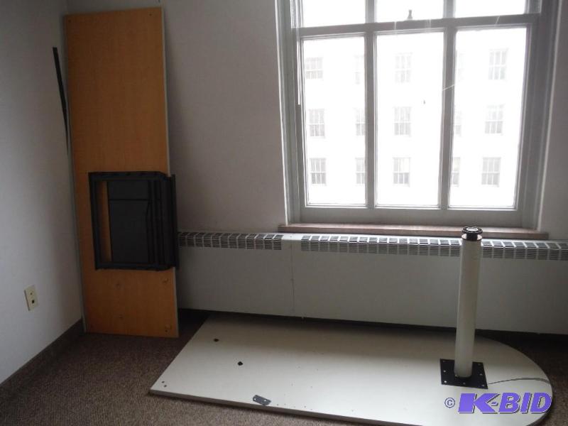 lot 1927 image: Contents of Room Adjustable Wall Mounted Desk Oval Desk White Board.