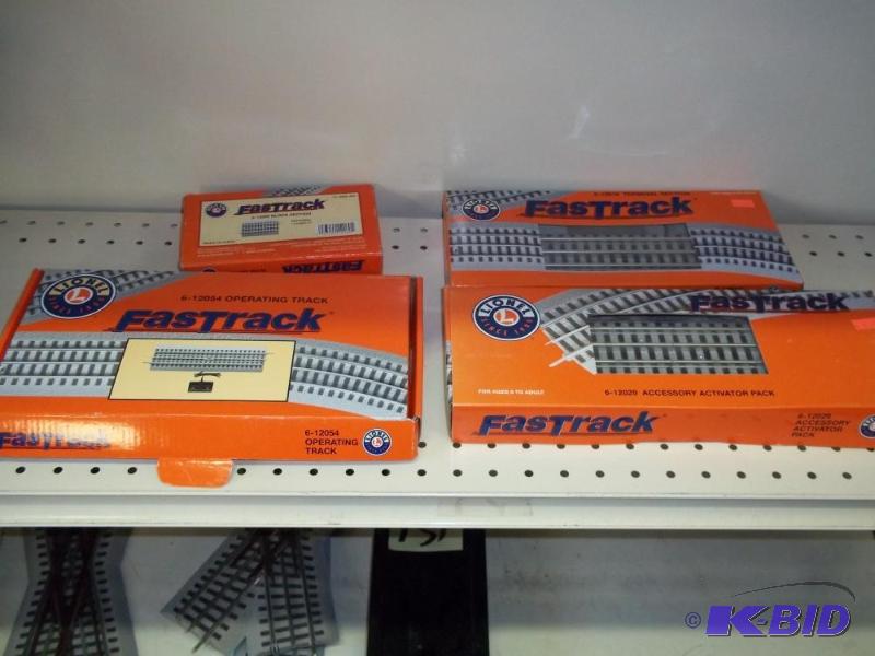 lot 132 image: 4 new in box Lionel FasTrack O Gauge Track...