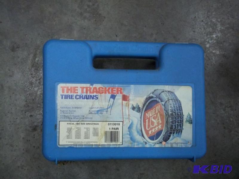 lot 148 image: Pair of tire chains with case last on 147 Cub...