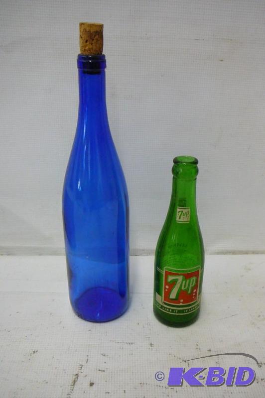 lot 18 image: 7up bottle 7oz and a blue wine bottle...