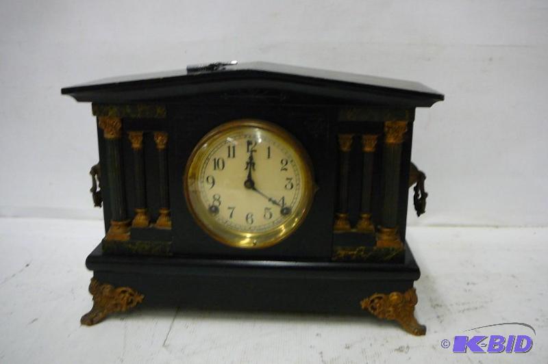 lot 56 image: Mantel clock with key made by The sessions cl...