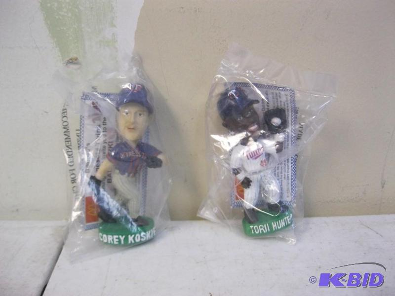 Pair Of Mini Bobble Heads...