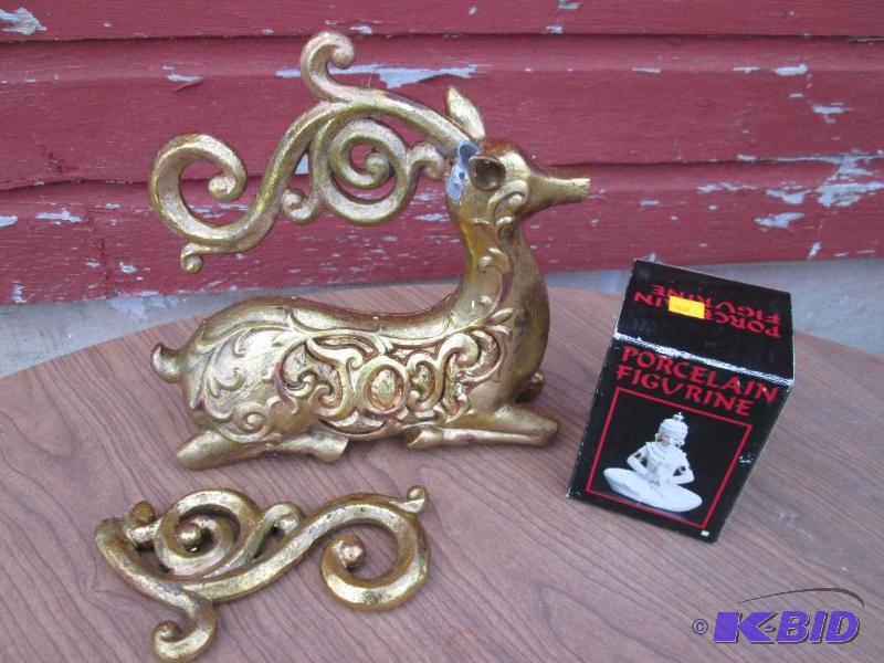 lot 109 image: Decorative deer with antler that needs repair...