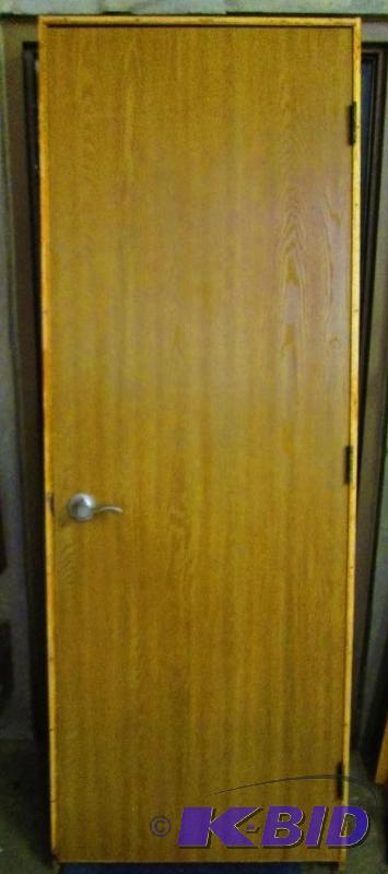 lot 18 image: Solid core door with L Handle, key not includ...
