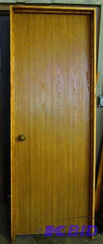 lot 19 image: Solid core door, round handle with a push but...