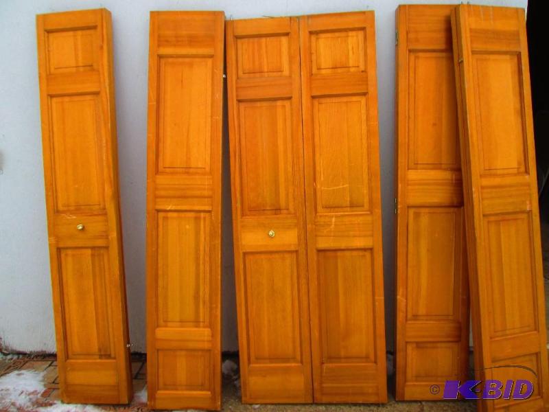 lot 22 image: 5 solid wood bi-fold doors...measure 14 34 x...