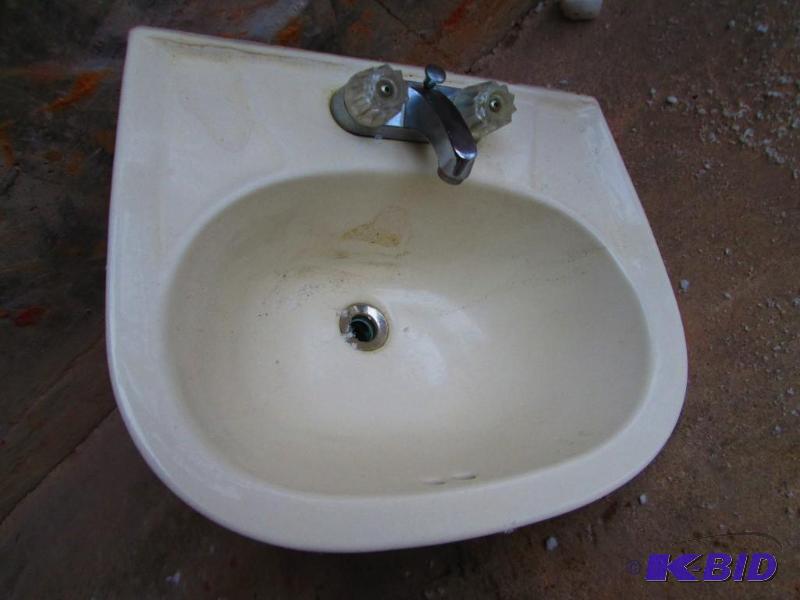 lot 23 image: Sink with faucet and drain...