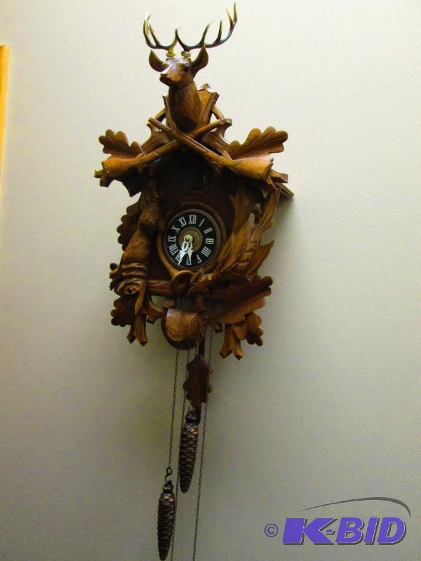 lot 4 image: German Coo Coo clock with solid metal weights...