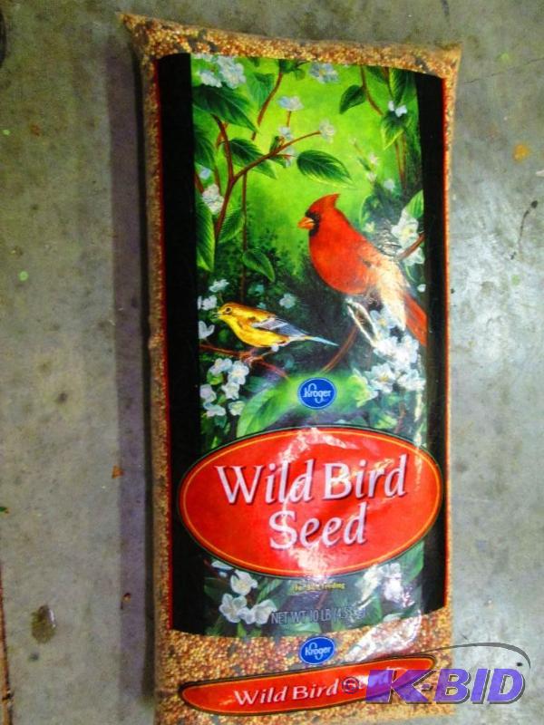 lot 41 image: 10 Pound bag of bird seed feed. Dated Nov. 20...