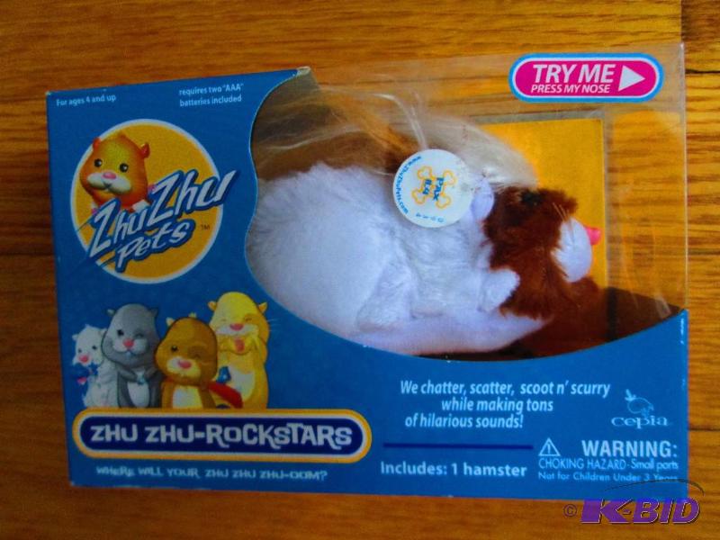 lot 59 image: Zhu Zhu pet, talking hamster...