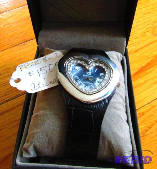 lot 61 image: Heart shaped Adrina quartz watch...