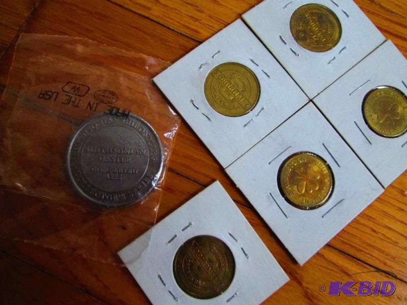 lot 65 image: Lot of collector game and other tokens, and a...