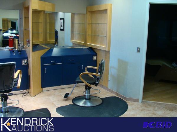 lot 1 image: Turn-Key Powered Custom Salon Styling Station with Chair, Mat, and Shelving