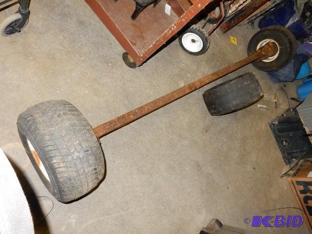 AXEL and wheels with Spare tire.. Some surfac...