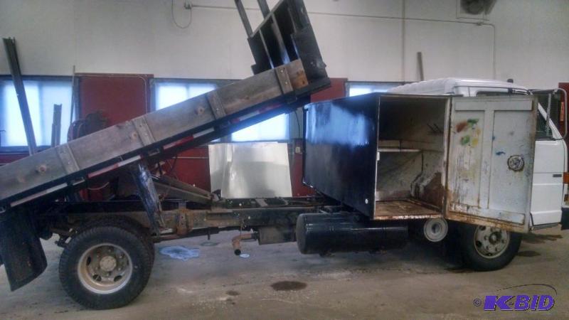 Isuzu Truck with dump bed.  RUNS