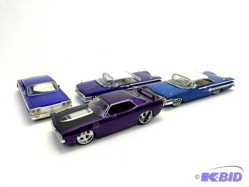 Four Die Cast Metal Cars