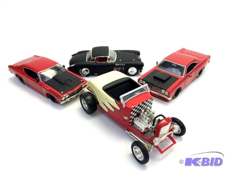 Four Die Cast Metal Cars
