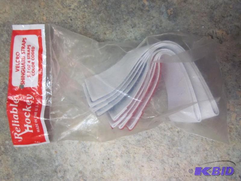 Set of (4) Velcro shinguard straps, new in pa...