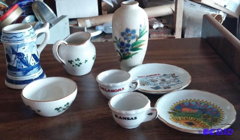 Lot of small porcelain tea cups and pitcher...