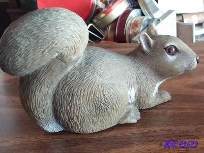 lot 18 image: Squirrel Statue...