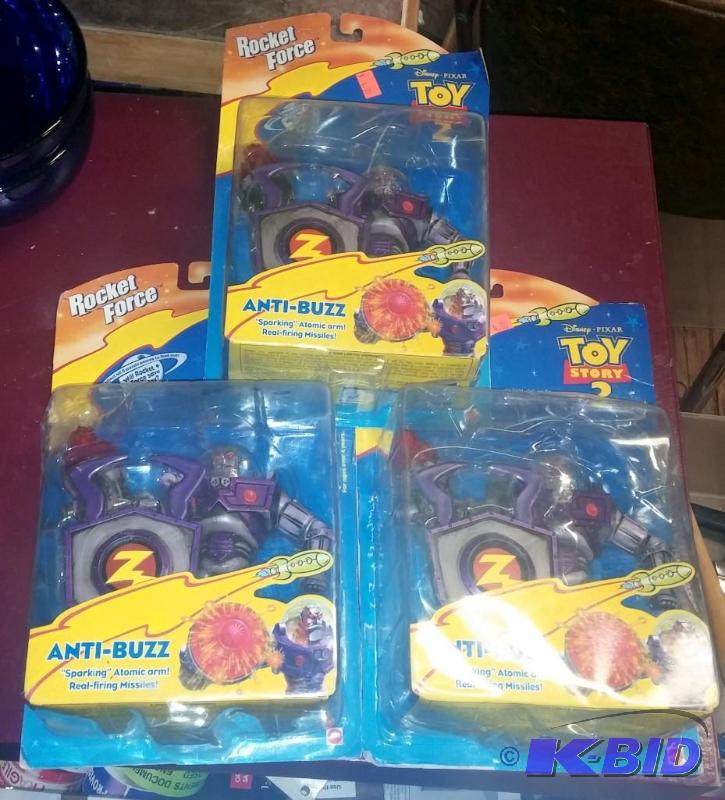 lot 34 image: Lot of 3 NEW Disney Pixar Anti-Buzz Toy...