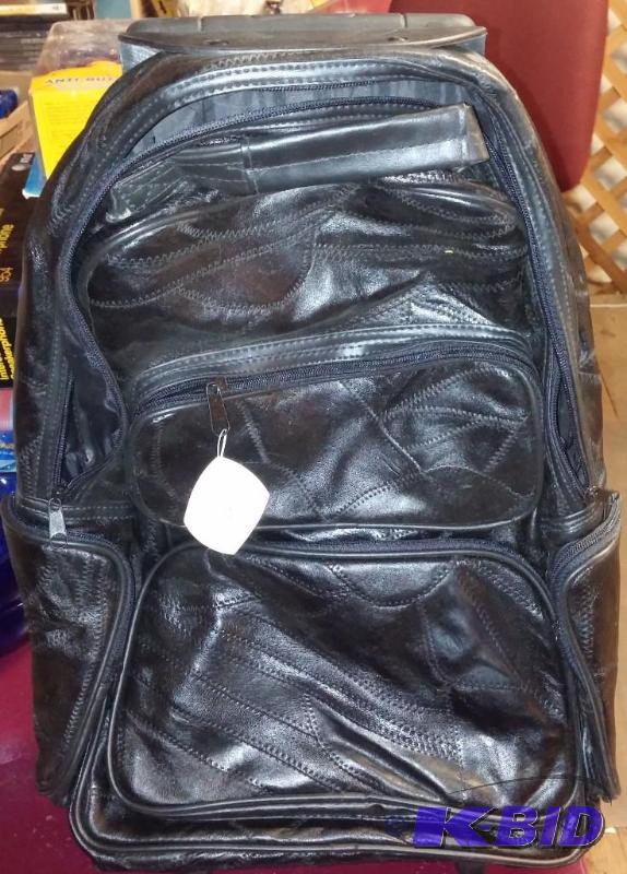 lot 52 image: New with Tag Genuine Leather Back Pack on whe...
