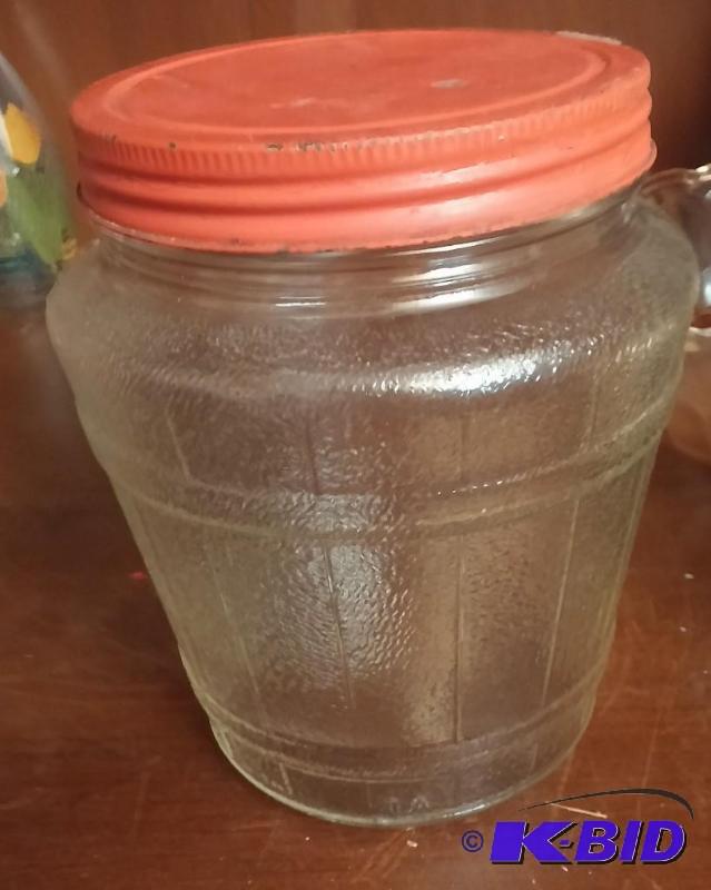 Vintage clear glass cookie jar with metal lid...