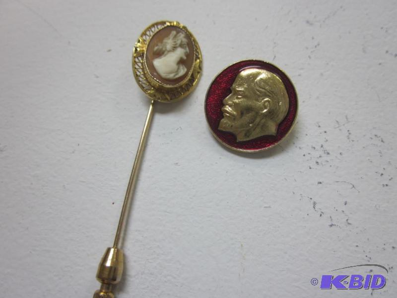 lot 1 image: An antique cameo pin, marked 10K and an antiq...