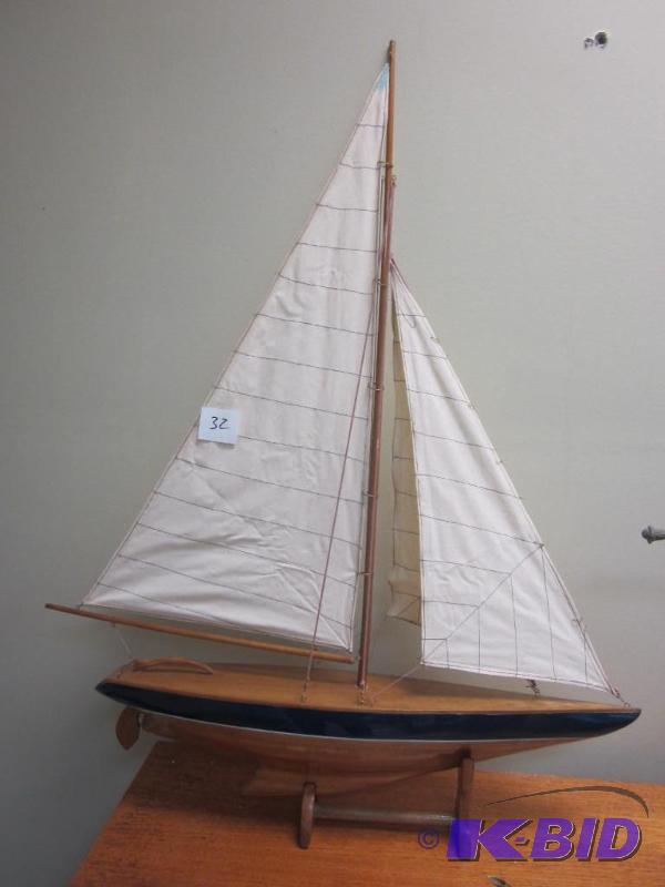 lot 32 image: Large 26 inch solid wood triple sail boat wit...