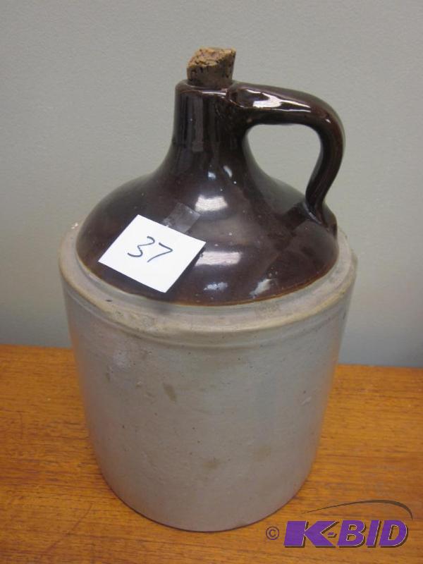 lot 37 image: Large stoneware jug with cork.     ...