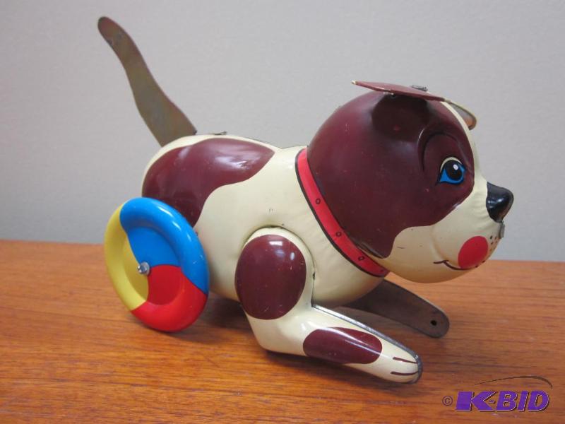 lot 53 image: Vintage made in China tin toy, friction dog, ...