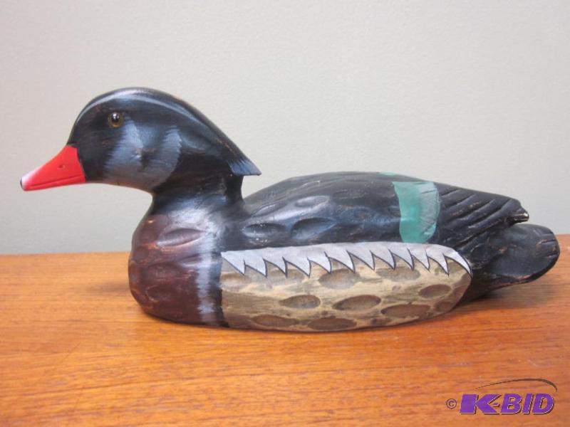 lot 59 image: 10 inch hand carved wooden duck by Heritage M...
