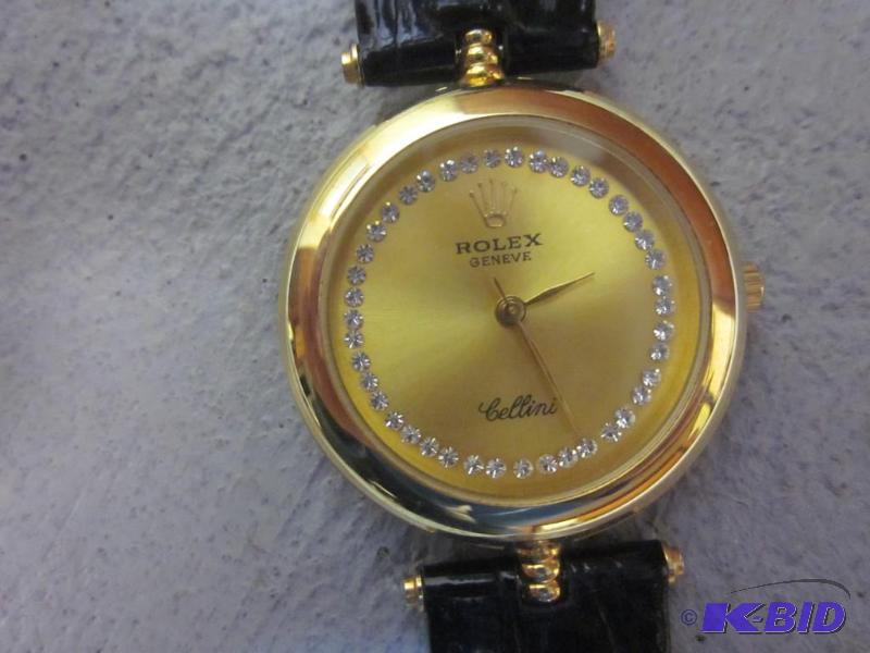 lot 8 image: Gold face leather band Rolex watch, unsure if...