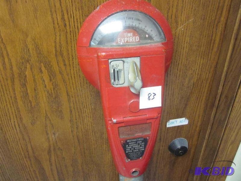 lot 83 image: Vintage cast metal red parking meter on pole....