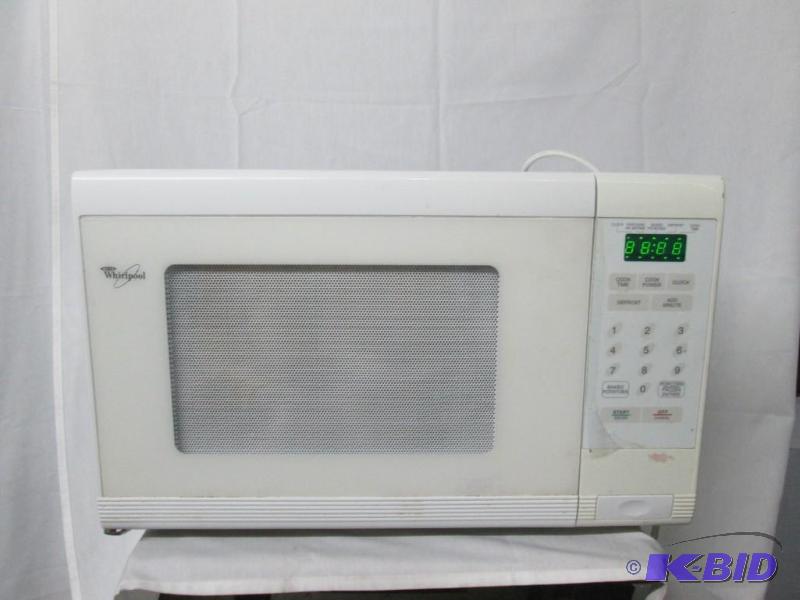lot 32 image: Whirlpool Microwave 0.9 cu. ft.