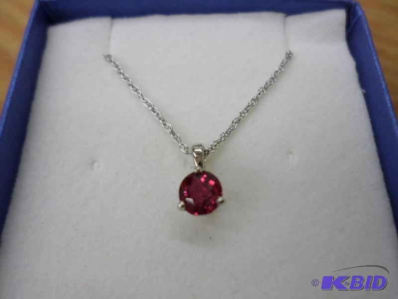 .55ct Ruby 14kt white gold pendant,. with a 1...