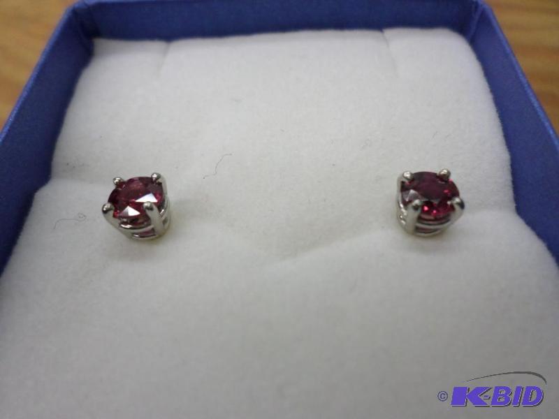 .90ct tw Ruby earrings in platinum settings. ...