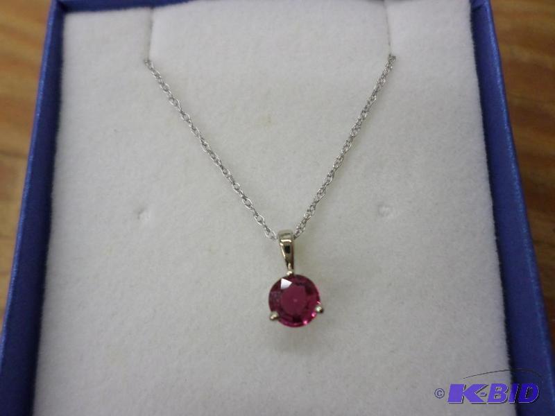 .35ct Ruby 14kt white gold pendant, with a 16...