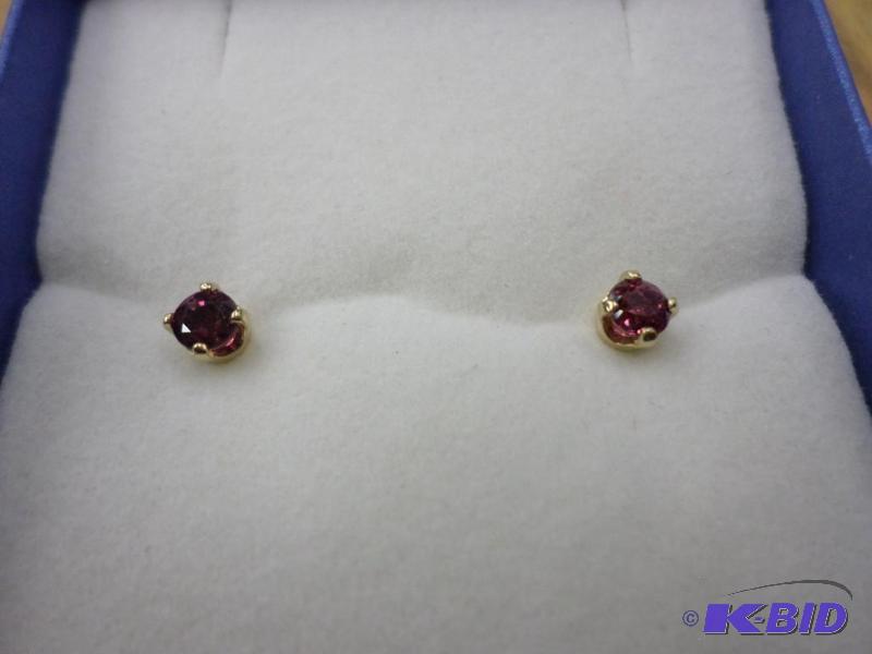 .35ct tw Ruby 14kt yellow gold earrings. Sugg...