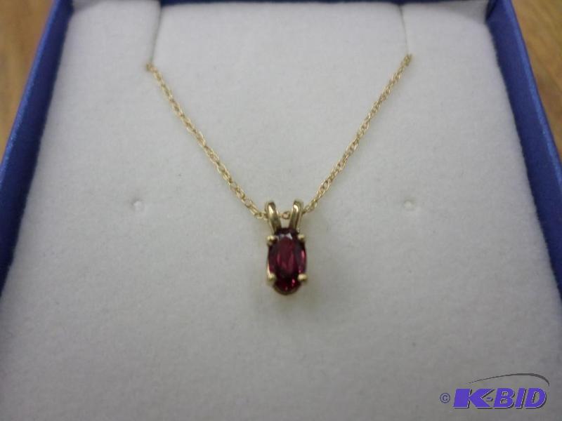 .31ct oval Ruby 14kt yellow gold pendant, wit...