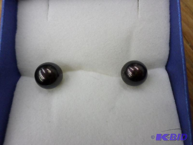 7.5mm dyed black Cultured Pearl earrings on 1...
