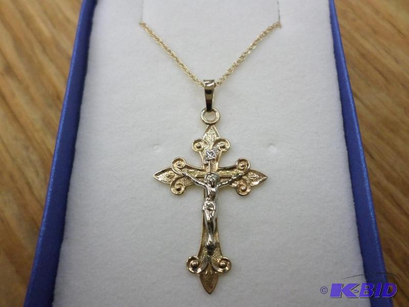 1.6 gram 14kt white and yellow gold crucifix ...