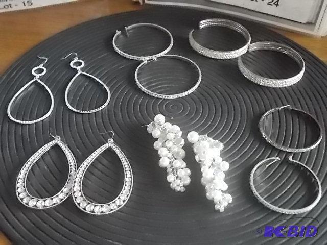 Silver Tone Pierced Earrings...