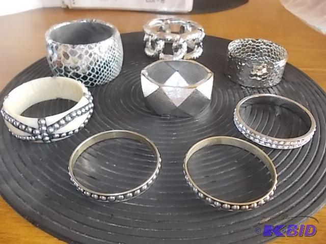 8-Silver Tone Bracelets...