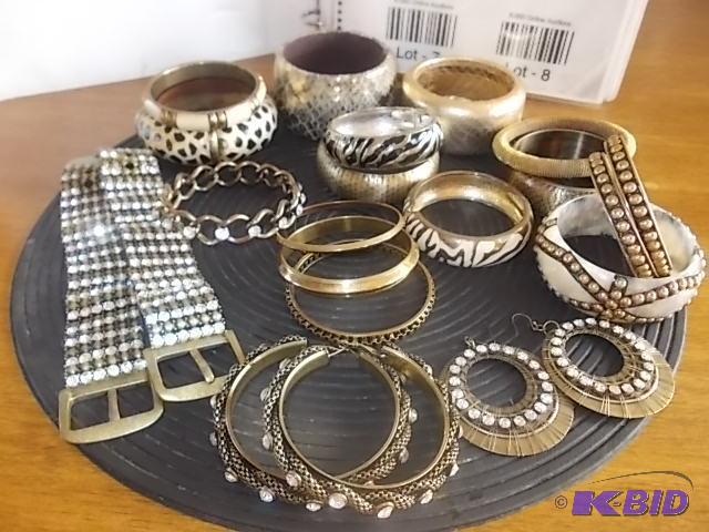 Large Lot Of Assorted Brass ToneBling Bracel...