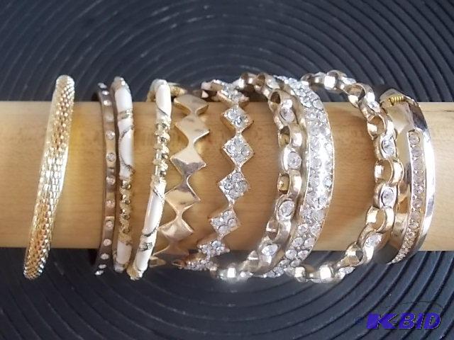 7-Fancy Gold Tone Bangle Bracelets...
