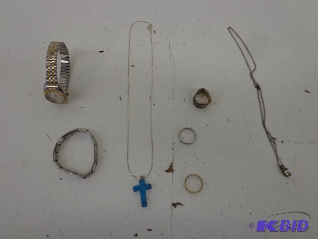 lot 124 image: NecklaceBraceletRings   Possible Topaz Cros...