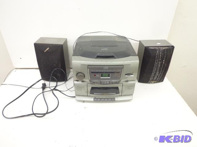 lot 151 image: Audiovox RadioCassetteCD Player   With Spea...
