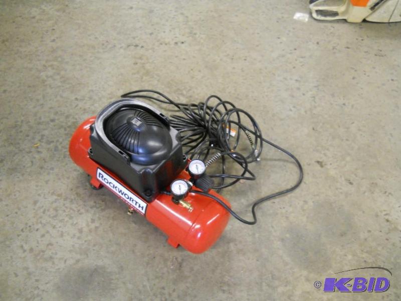 lot 10 image: Rockworth Air Compressor. Like new.
